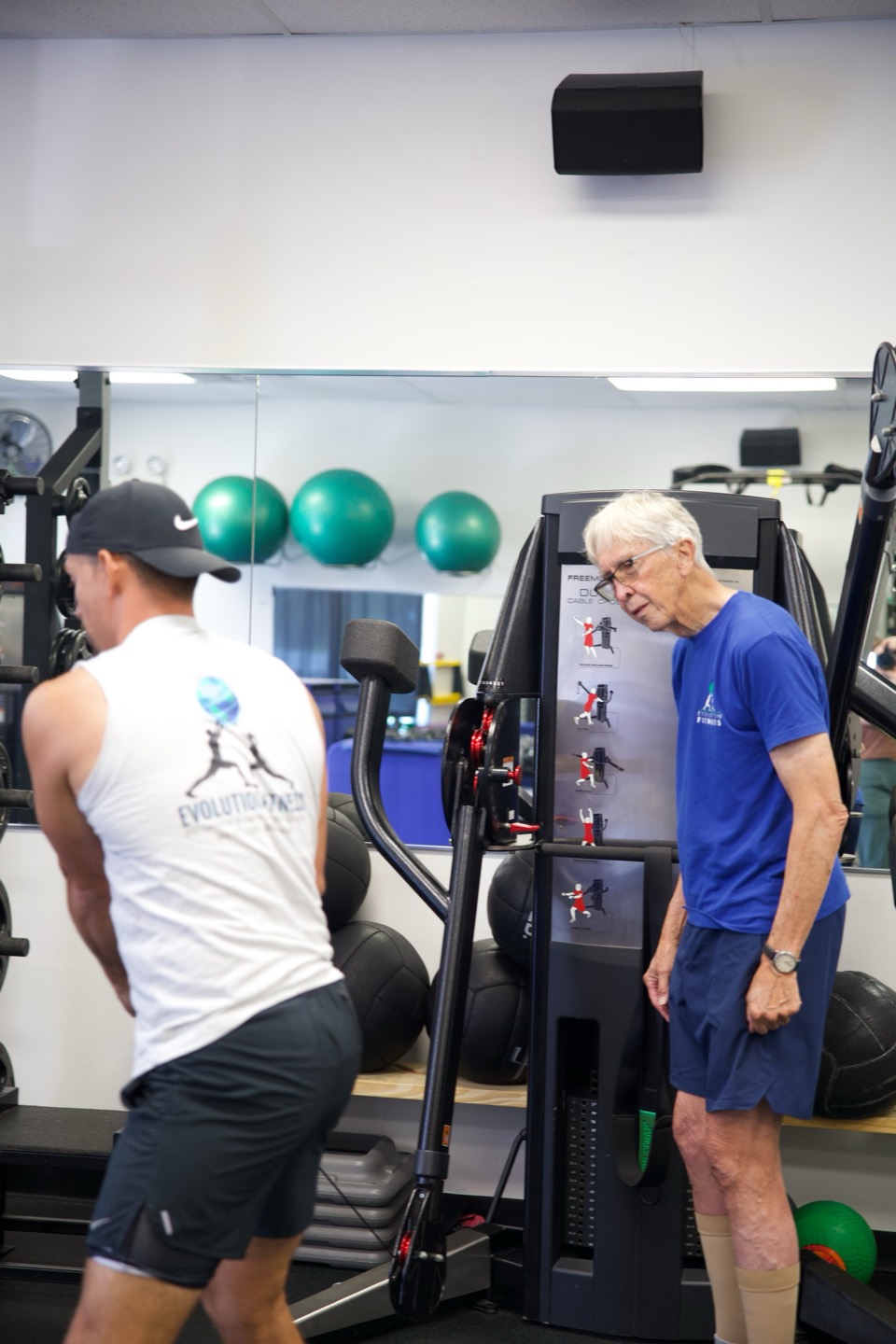 Coach working with a member